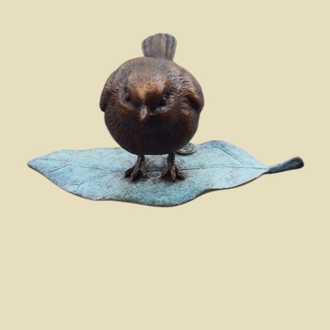 BD38. Bronze d'un petit oiseau