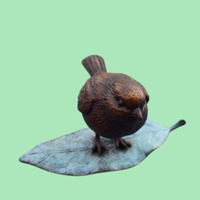 BD38. Bronze d'un petit oiseau