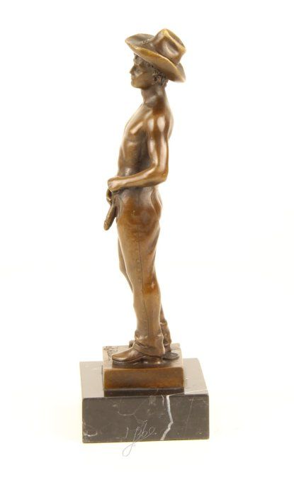 BE29.Bronze sur marbre d'un cowboy